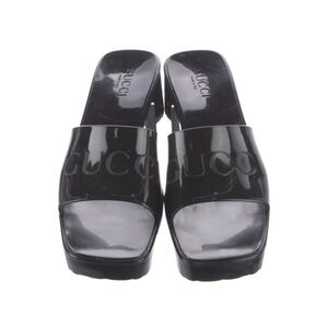 Gucci Rubber Slide Sandals.